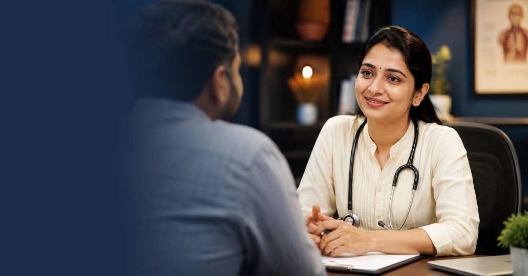 A patient and a member of our care team in conversation at the start of a consultation.